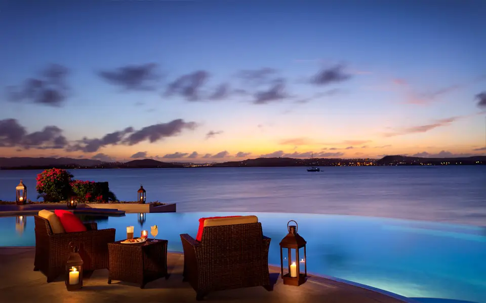 Sunset Caribbean Jumby Bay luxury holiday