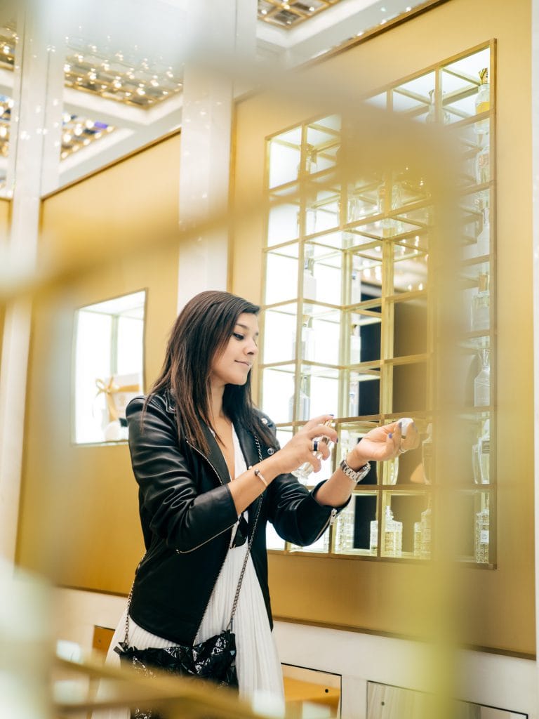 The Style Traveller bonnie buying perfume at Creed