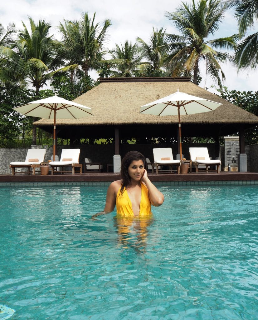 Bonnie Rakhit style traveller Raffles Hainan luxury hotel fashion swimsuit
