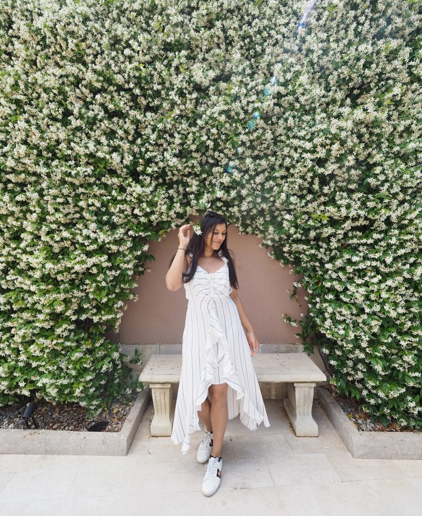 Bonnie Rakhit Style Traveller at Regent porto Montenegro flower walls