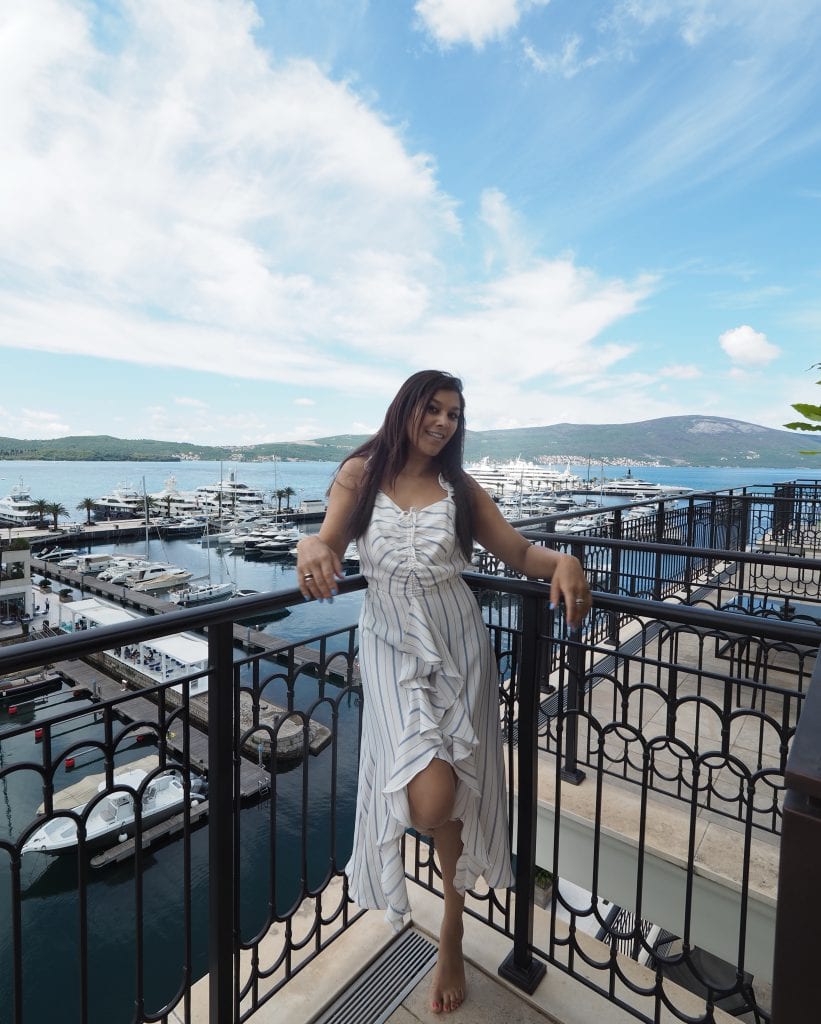 Bonnie Rakhit Style Traveller at Regent porto Montenegro luxury balcony