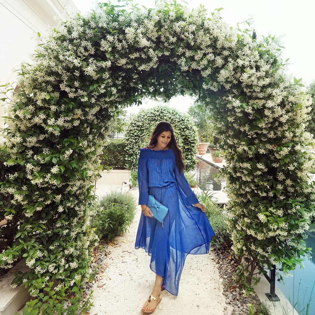 Bonnie Rakhit Style Traveller at Regent porto Montenegro flower tunnel