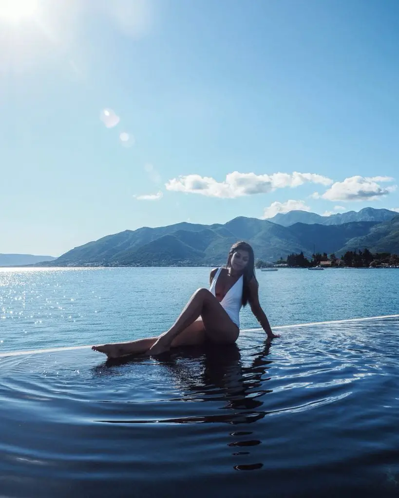 Bonnie Rakhit Style Traveller at Regent porto Montenegro luxury hotel infinity pool