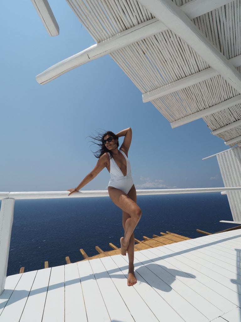 Bonnie Rakhit TRX straps on Helios best europe Fitness Retreats Mykonos