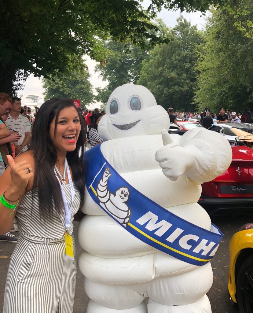 Bonnie Rakhit Goodwood festival of speed with Ferrari sports cars vip pass female racing Michellin man