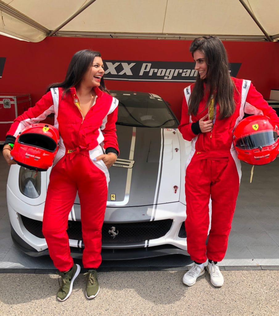 Bonnie Rakhit Goodwood festival of speed with Ferrari sports cars vip pass female racing driver suits Lara Heller