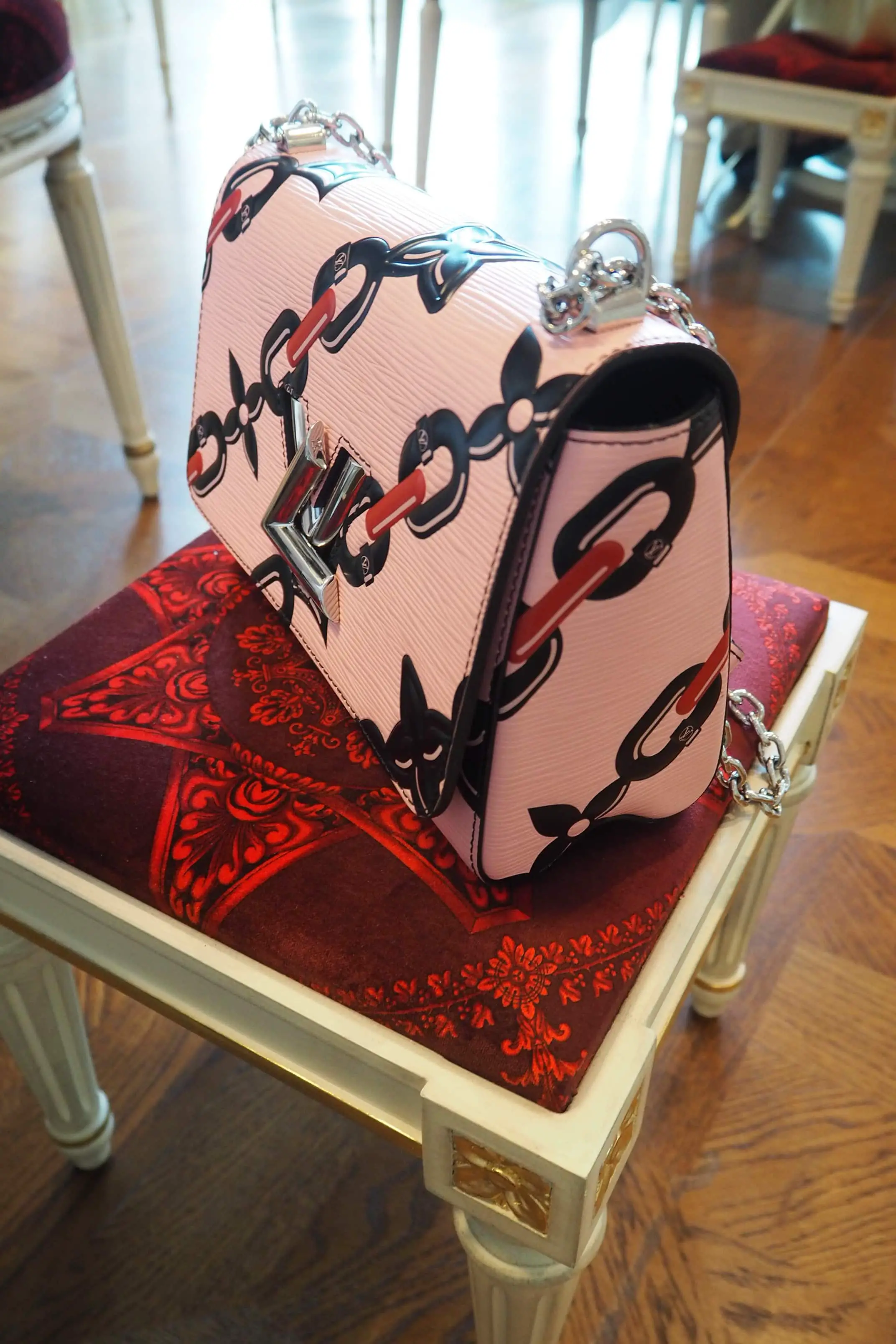 Louis Vuitton bag restaurant seat - The Style Traveller
