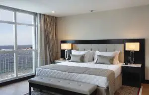 luxury miramar-hotel-by-windsor-bedroom window sea view bedroom