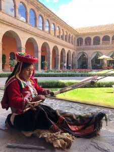 Belmond Monasterio best luxury hotels in Cusco Bonnie Rakhit traditional weaver in Peruvian costume
