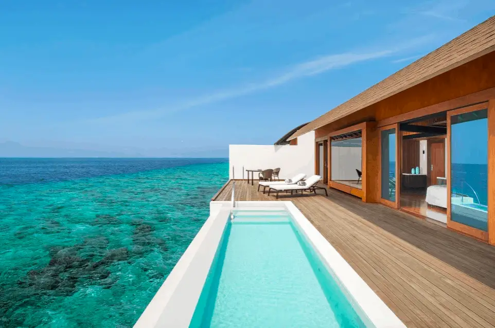 swimming pool deck at water villa westin maldives