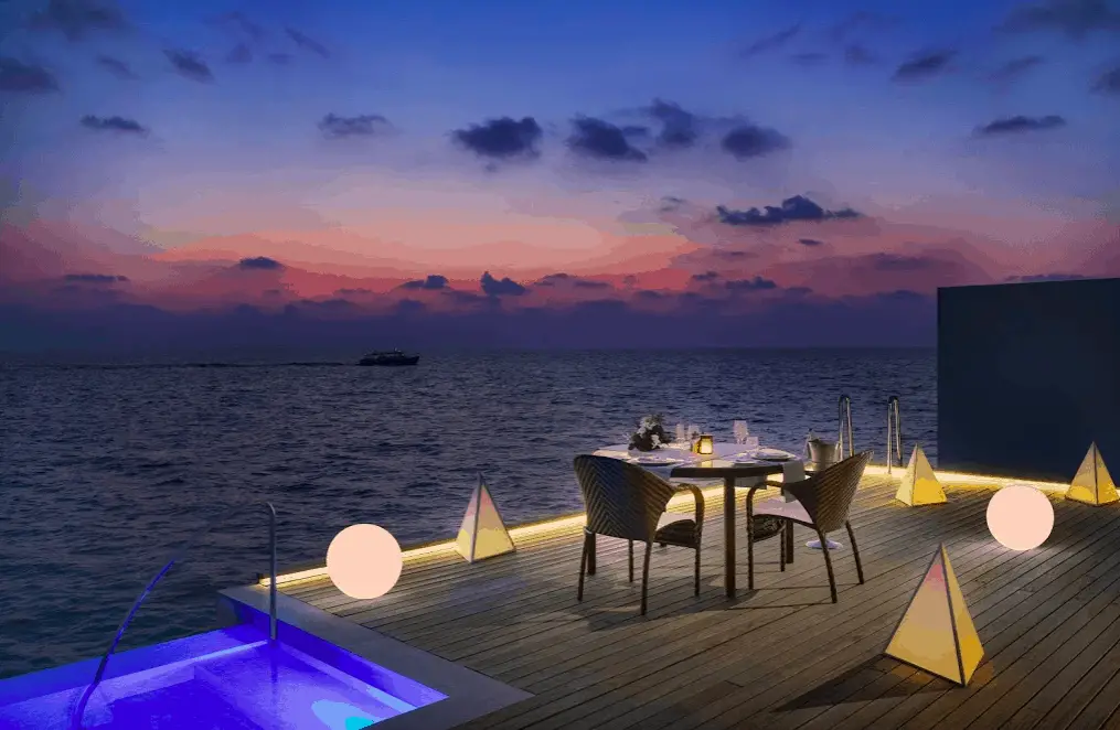 sunset at the poolside westin maldives