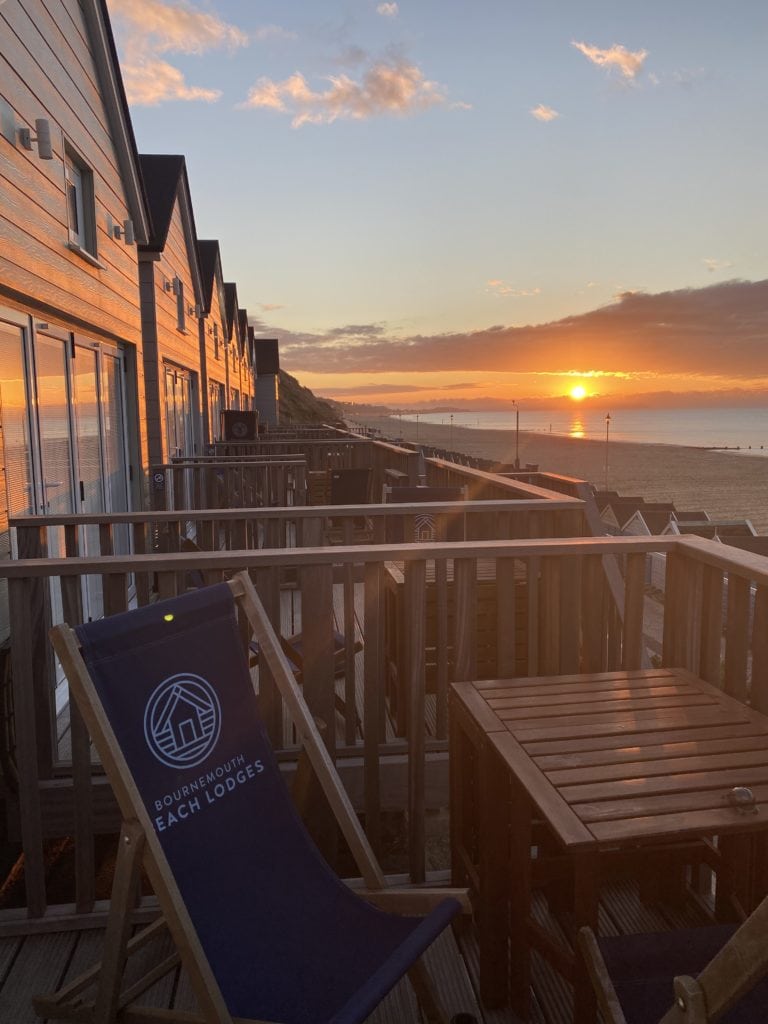 The Perfect UK Staycation Bournemouth beach lodges at sunset