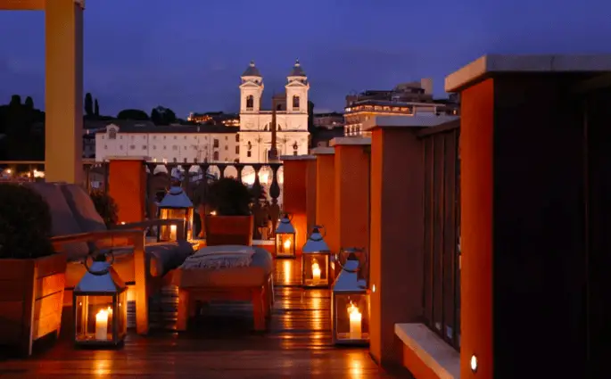 Rome's Most Stylish Italian Town House Hotel - Portrait Roma suite terrace at night